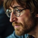 Découvrez qui accompagne John Lennon sur la photo originale